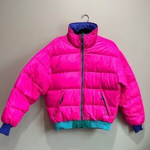 Bold Pink Puffer Jacket with Blue and Green Details